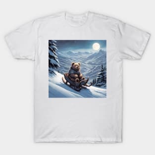 Teddy on a sledge riding down a hill in the snow T-Shirt